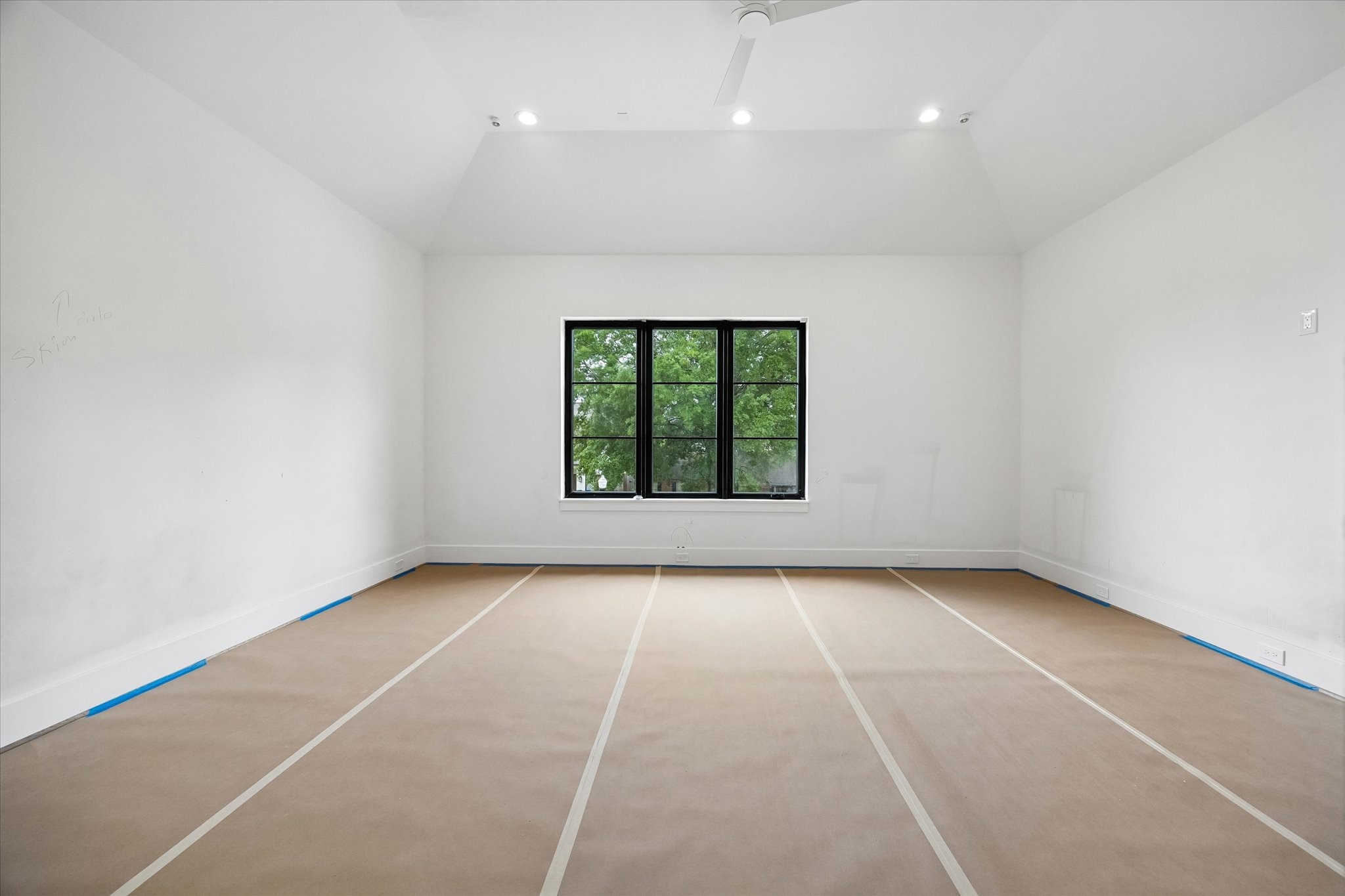 1328 Mickey Way Spring Valley Village, TX 77055 - Photo 15 of 26 Primary Bedroom with vaulted ceilings and overlooking serene landscaping. Pictured April 2026.