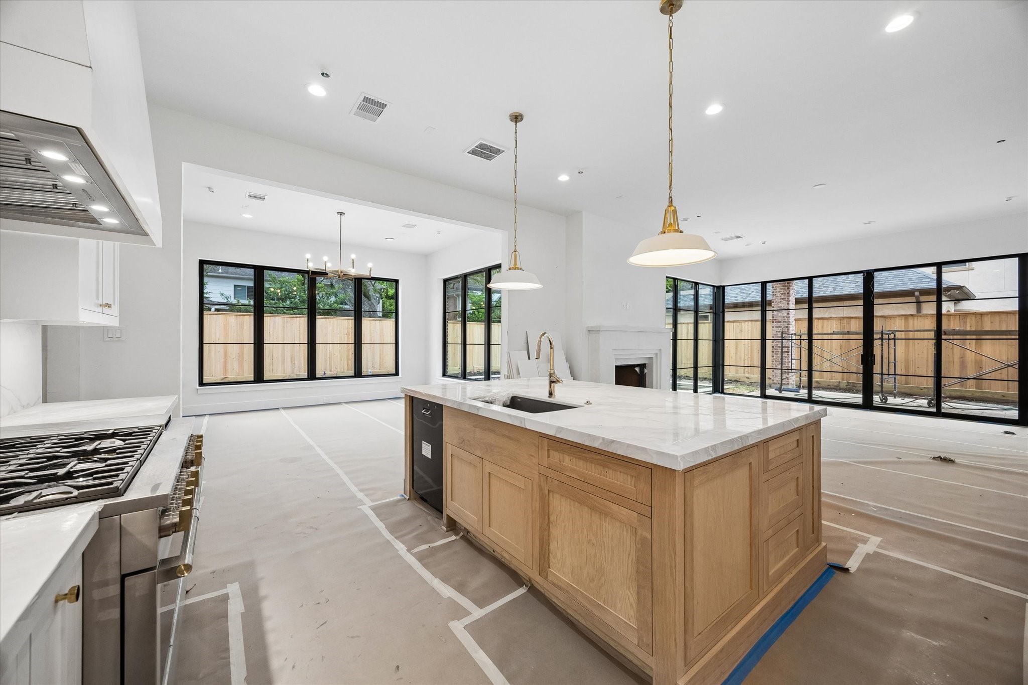 1328 Mickey Way Spring Valley Village, TX 77055 - Photo 5 of 26 Gorgeous windows provide ample natural light, creating an open and inviting atmosphere overlooking the backyard and covered outdoor kitchen/living space. Pictured April 2026.