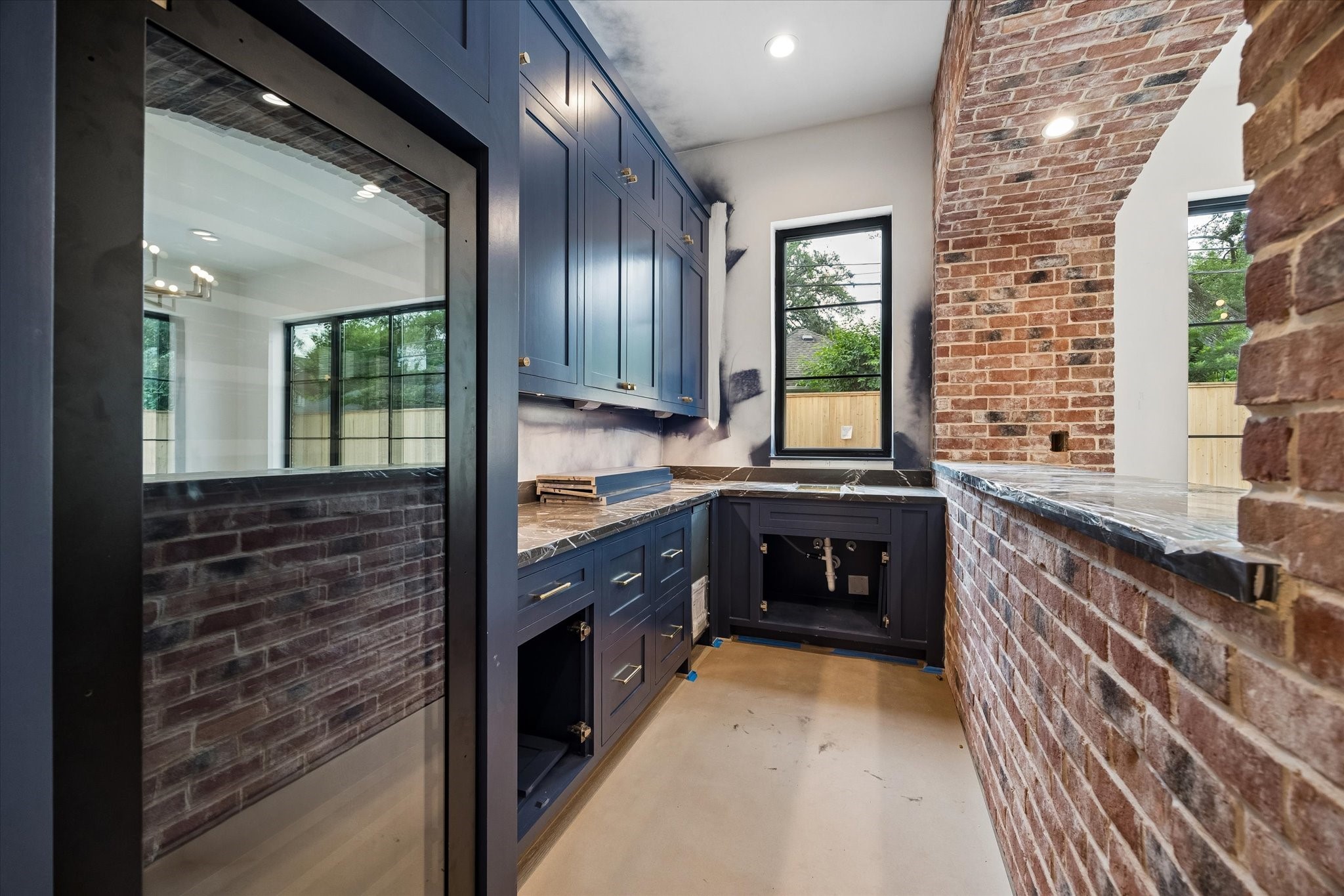 1328 Mickey Way Spring Valley Village, TX 77055 - Photo 8 of 26 Perfect for entertaining this elegant bar features full-size paneled wine refrigerator, ice maker and sink. Pictured April 2026.