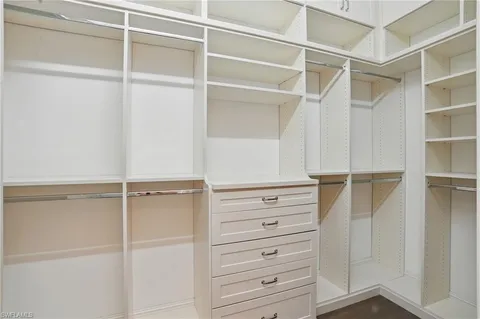 a view of an empty walk in closet