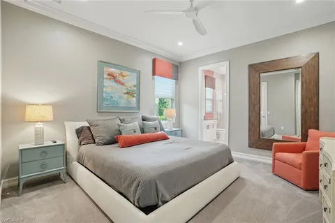 a bedroom with a bed and furniture