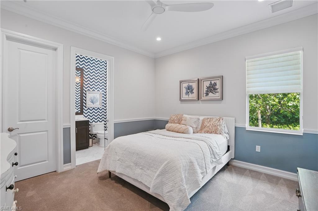 17218 Hidden Estates Circle Fort Myers, FL 33908 - Photo 30 of 50 a bedroom with a bed and a window