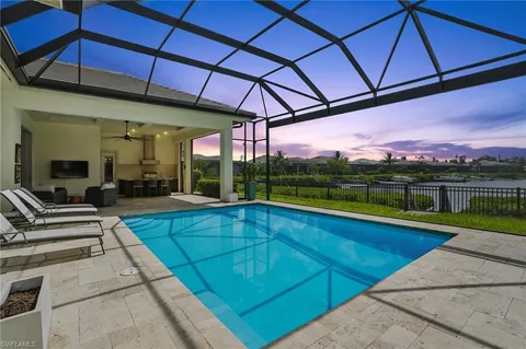 a view of a swimming pool with a patio