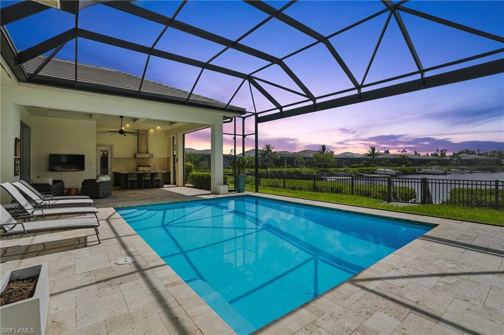 17218 Hidden Estates Circle Fort Myers, FL 33908 - Photo 36 of 50 a view of a swimming pool with a patio