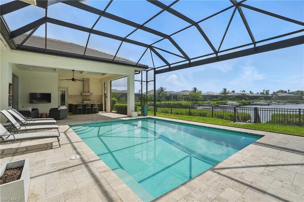 17218 Hidden Estates Circle Fort Myers, FL 33908 - Photo 37 of 50 a view of a swimming pool with a patio