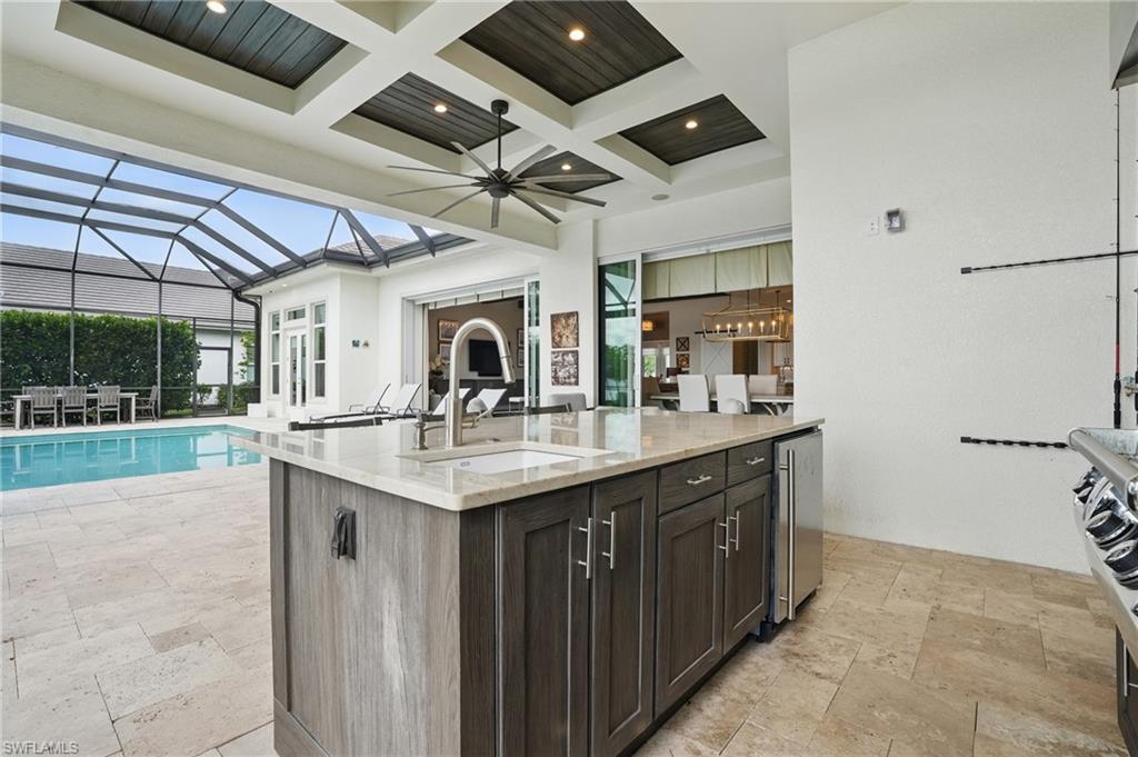 17218 Hidden Estates Circle Fort Myers, FL 33908 - Photo 42 of 50 a kitchen with stainless steel appliances granite countertop a sink and cabinets