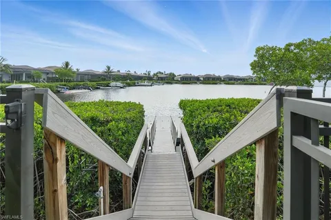 a terrace view with two chairs and a table