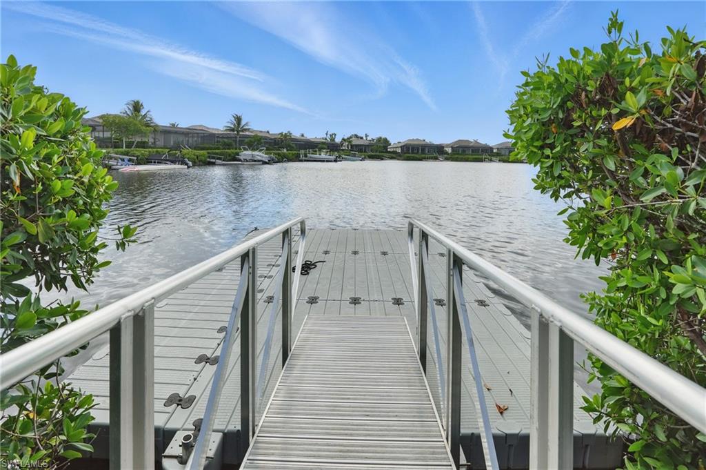 17218 Hidden Estates Circle Fort Myers, FL 33908 - Photo 44 of 50 a terrace view with two chairs and a table