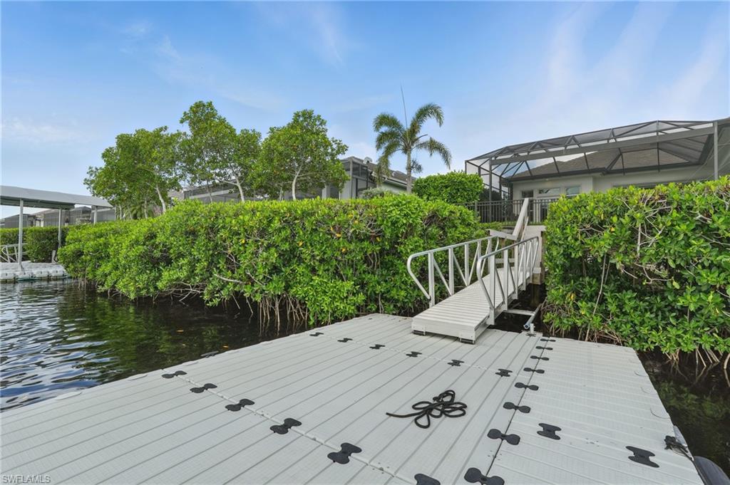 17218 Hidden Estates Circle Fort Myers, FL 33908 - Photo 45 of 50 a view of a backyard with plants
