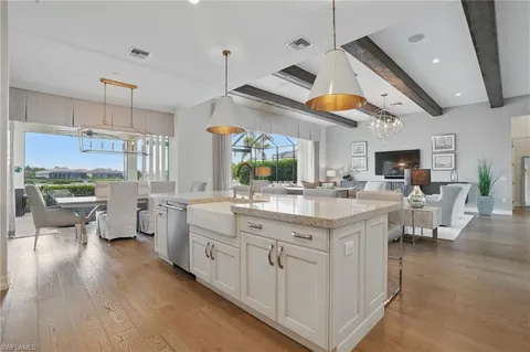 a kitchen with stainless steel appliances granite countertop lots of counter top space