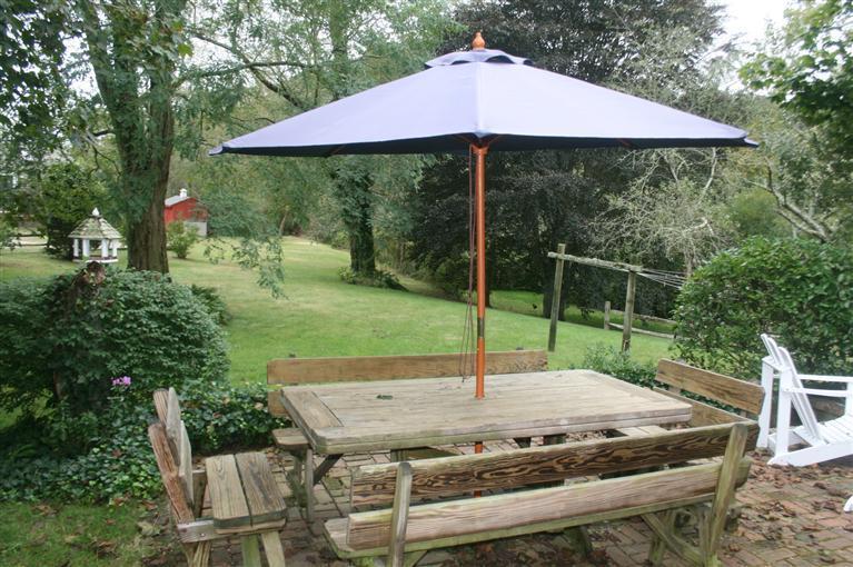 305 Mill Road Eastham, MA 02642 - Photo 7 of 34 a garden view with a seating space