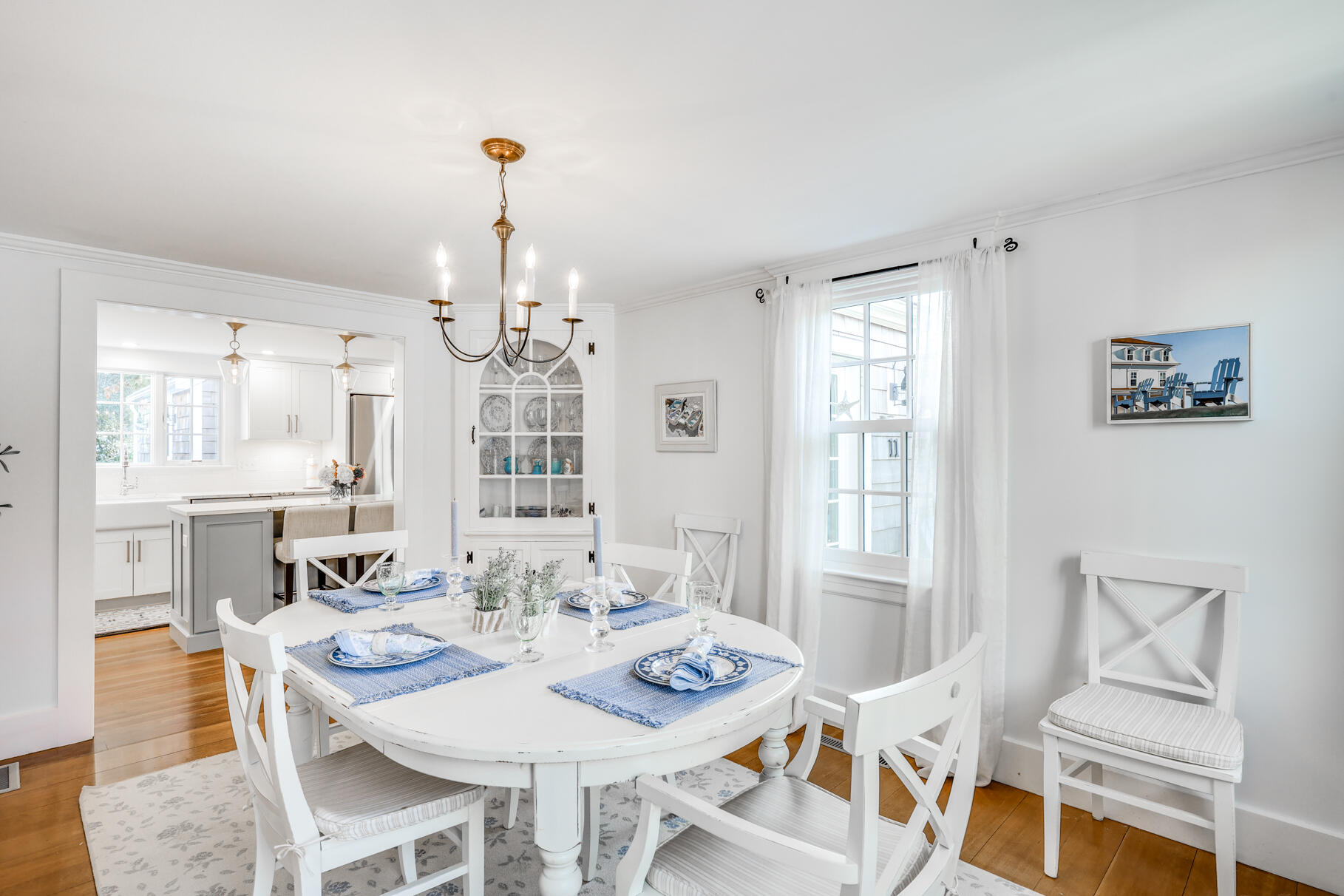 11 Seaview Road Orleans, MA 02653 - Photo 18 of 42 a view of a dining room with furniture window and wooden floor