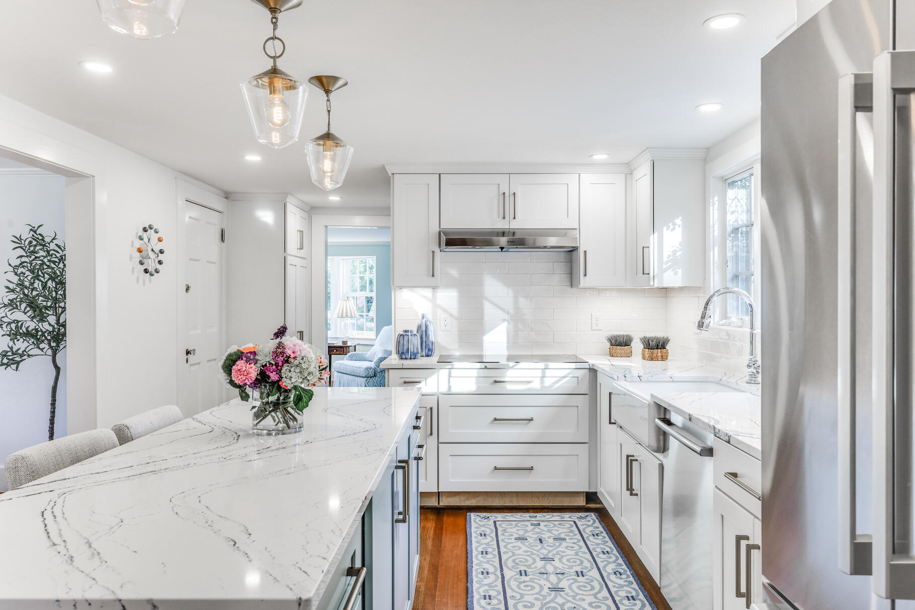 11 Seaview Road Orleans, MA 02653 - Photo 2 of 42 a kitchen that has a lot of cabinets a sink and appliances in it