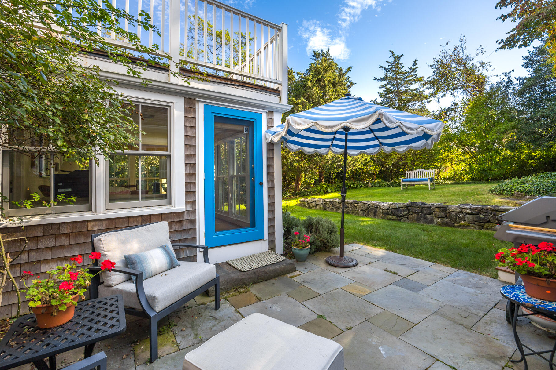 11 Seaview Road Orleans, MA 02653 - Photo 27 of 42 a view of a patio with a table and chairs