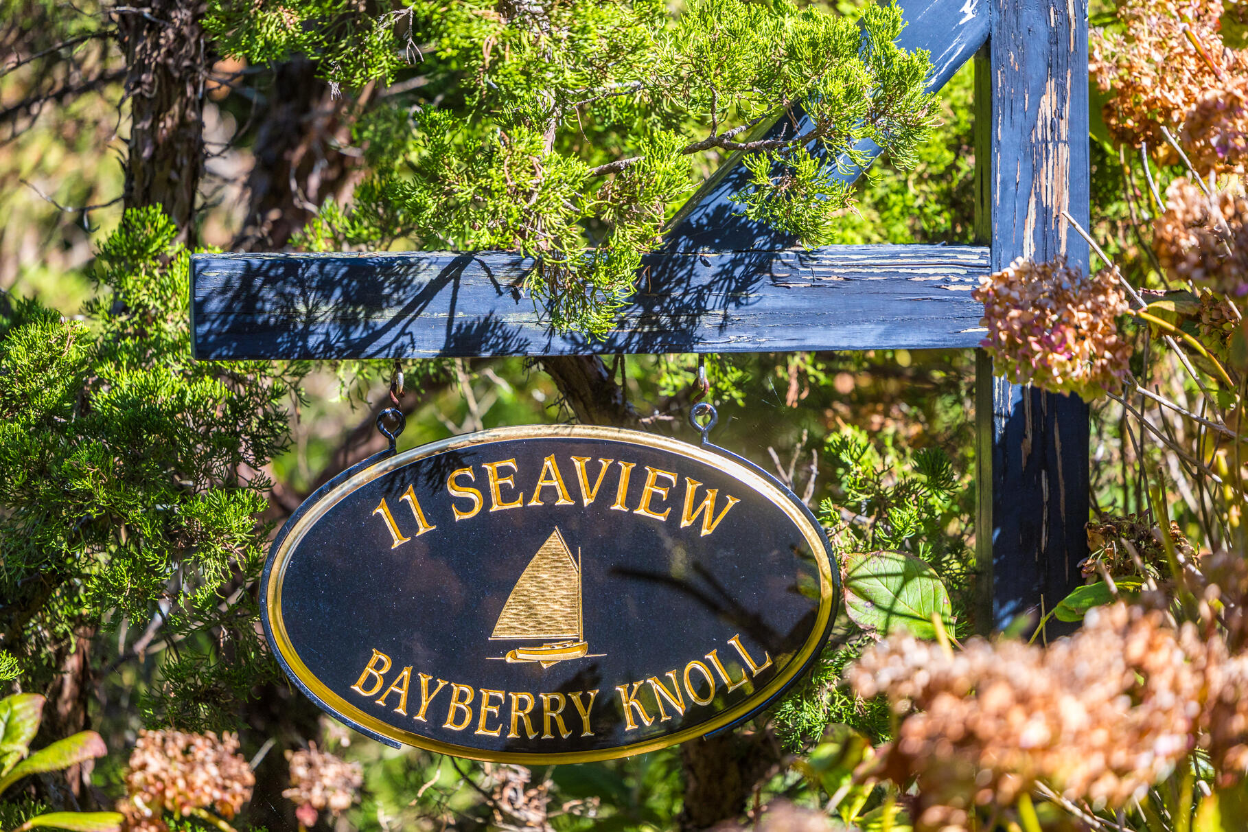 11 Seaview Road Orleans, MA 02653 - Photo 42 of 42 a sign that is sitting next to a tree