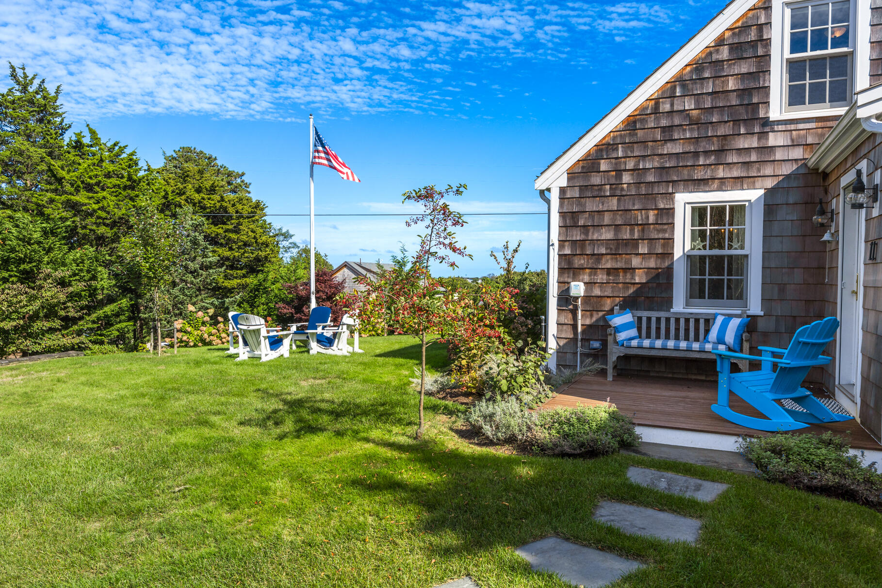 11 Seaview Road Orleans, MA 02653 - Photo 5 of 42 a backyard of a house with seating space