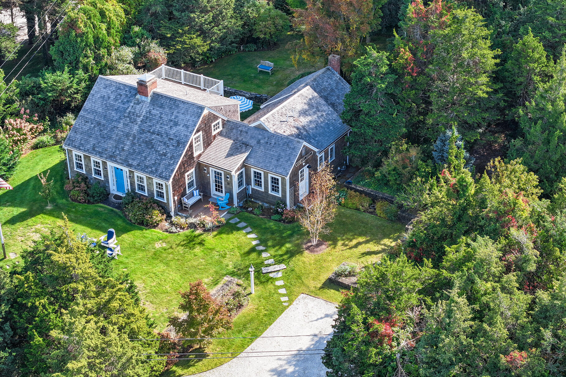 11 Seaview Road Orleans, MA 02653 - Photo 6 of 42 an aerial view of a house with a yard table and chairs