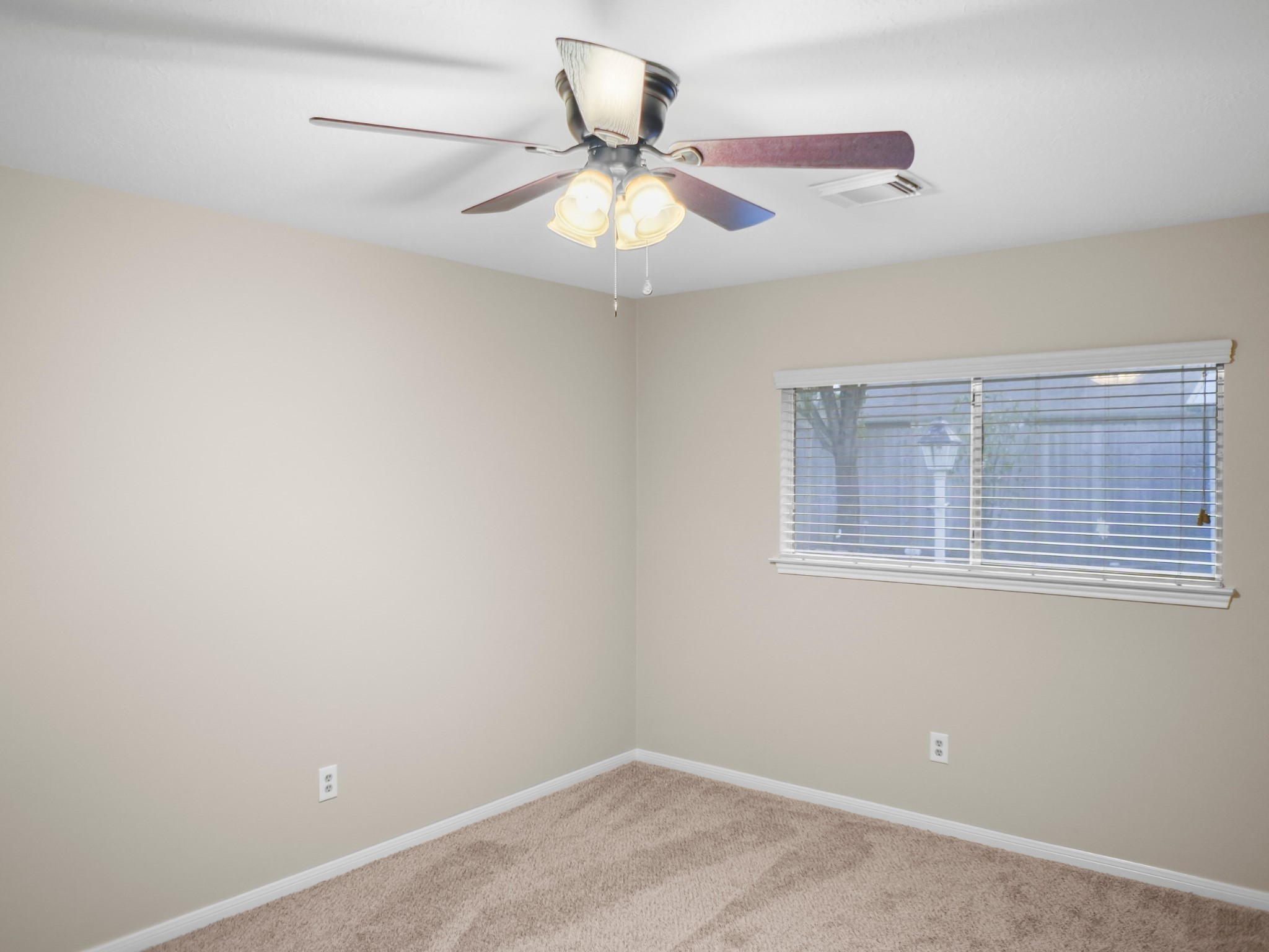 19623 Westbridge Lane Spring, TX 77379 - Photo 20 of 48 an empty room with a window and a fan