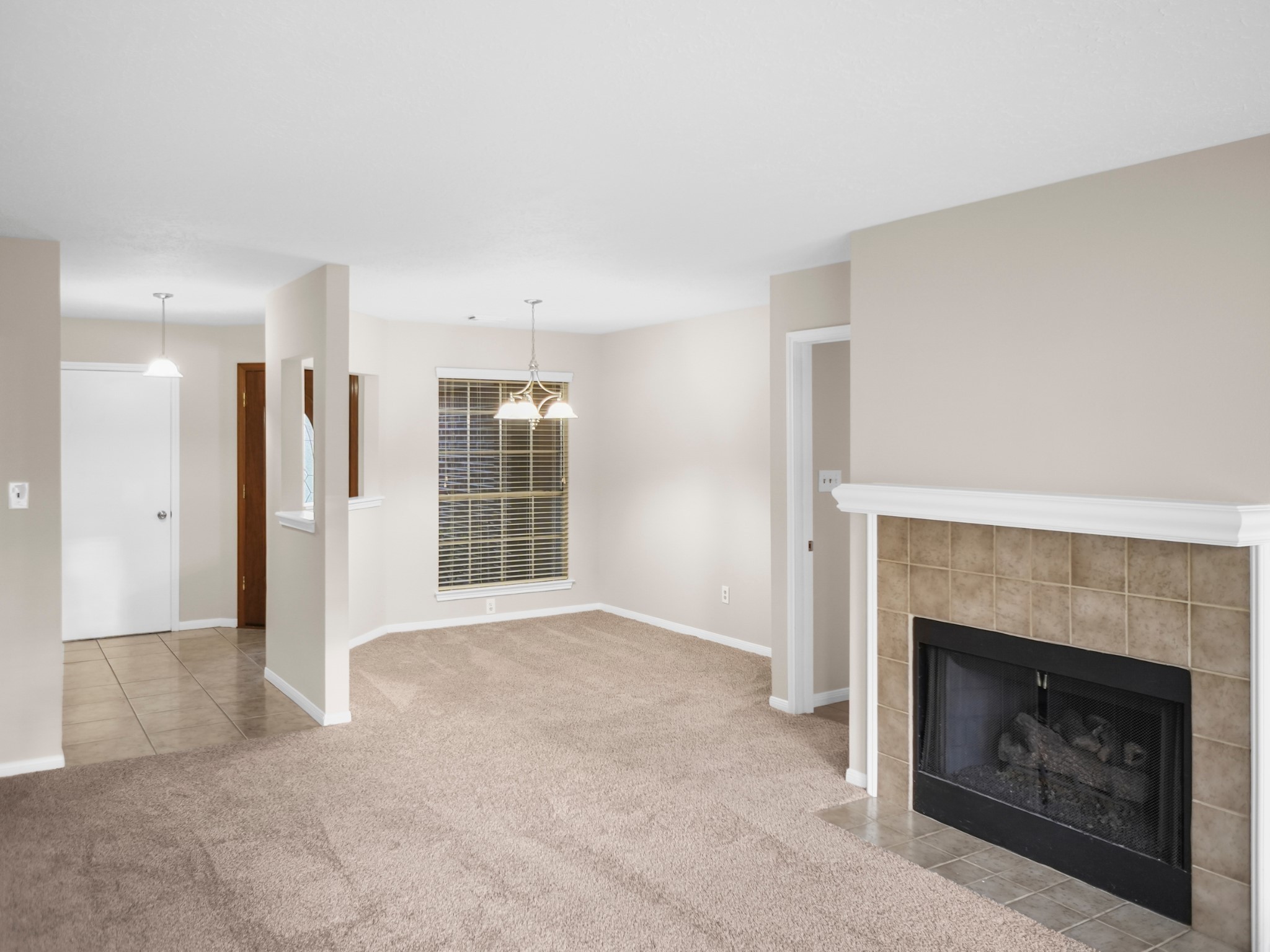 19623 Westbridge Lane Spring, TX 77379 - Photo 27 of 48 a view of a livingroom with a fireplace and window