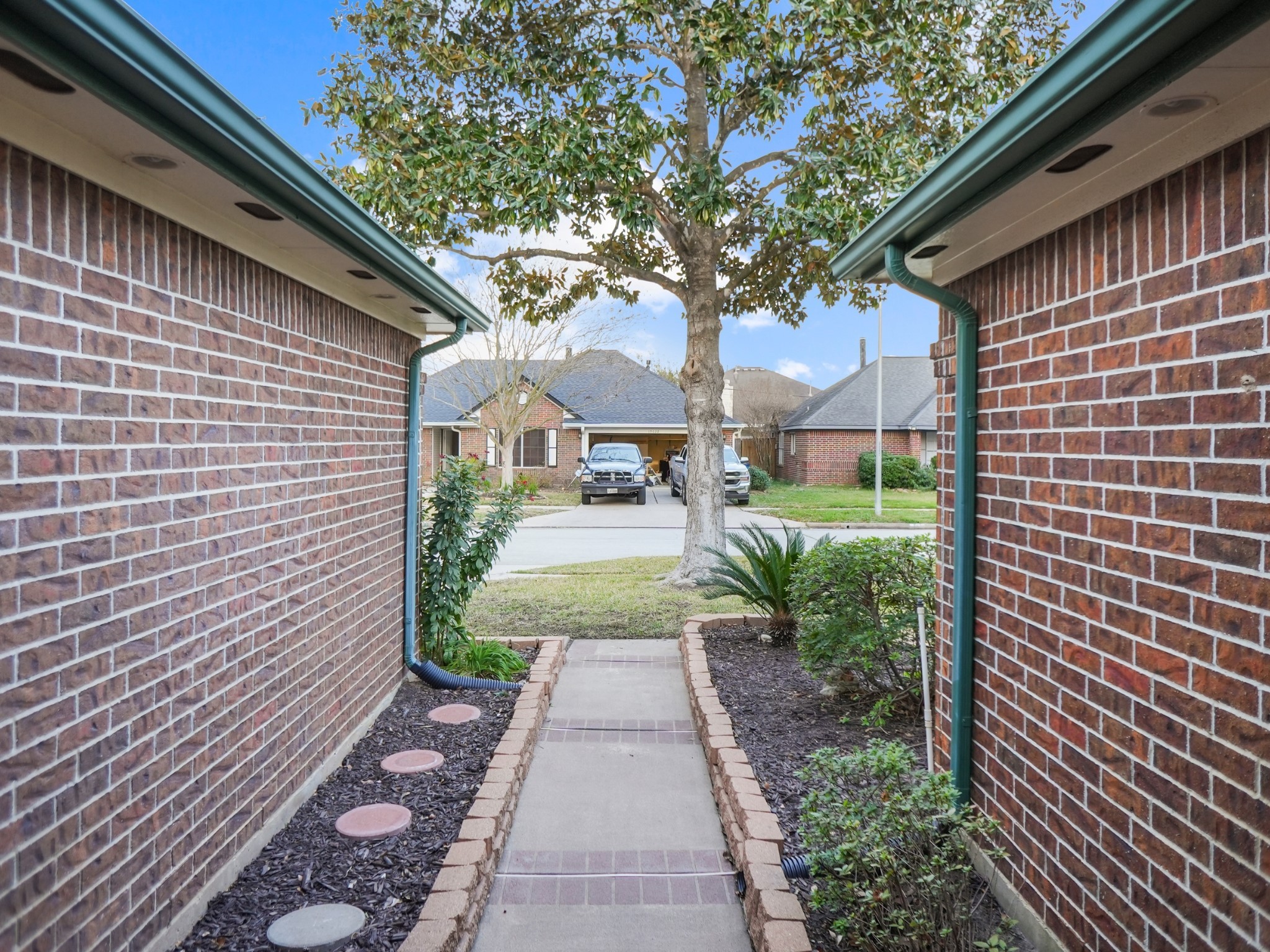 19623 Westbridge Lane Spring, TX 77379 - Photo 29 of 48 a view of a pathway with a house
