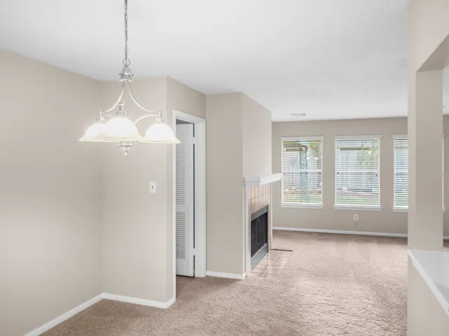 a stove top oven sitting inside of a kitchen