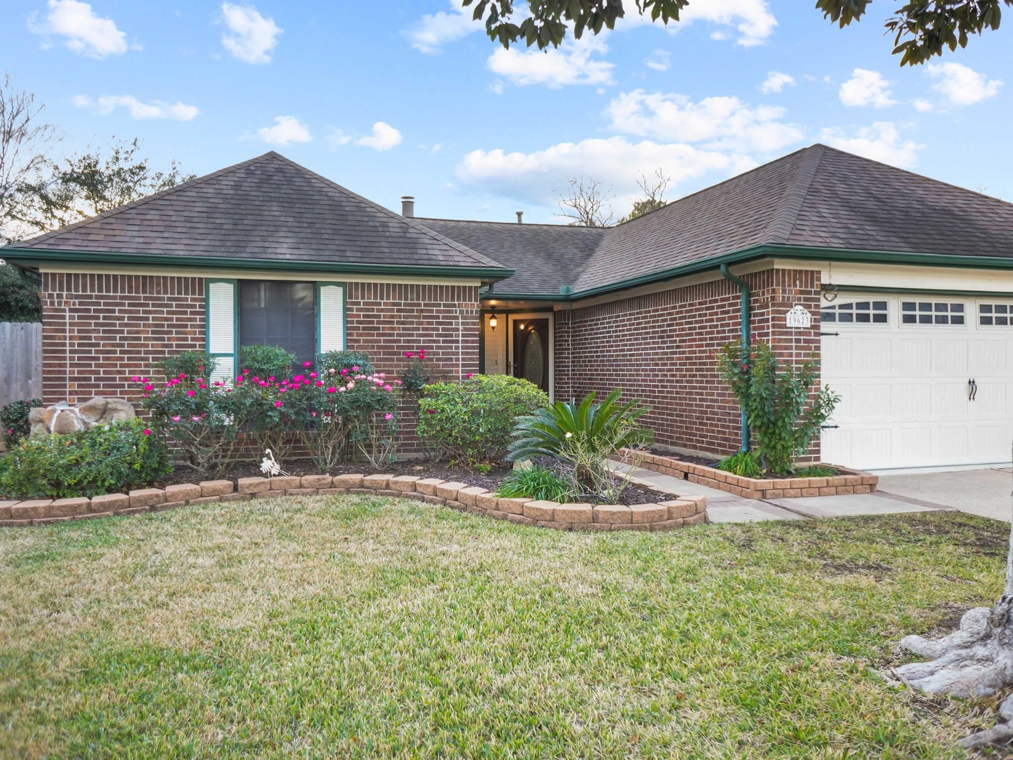 19623 Westbridge Lane Spring, TX 77379 - Photo 33 of 48 a front view of house with garden