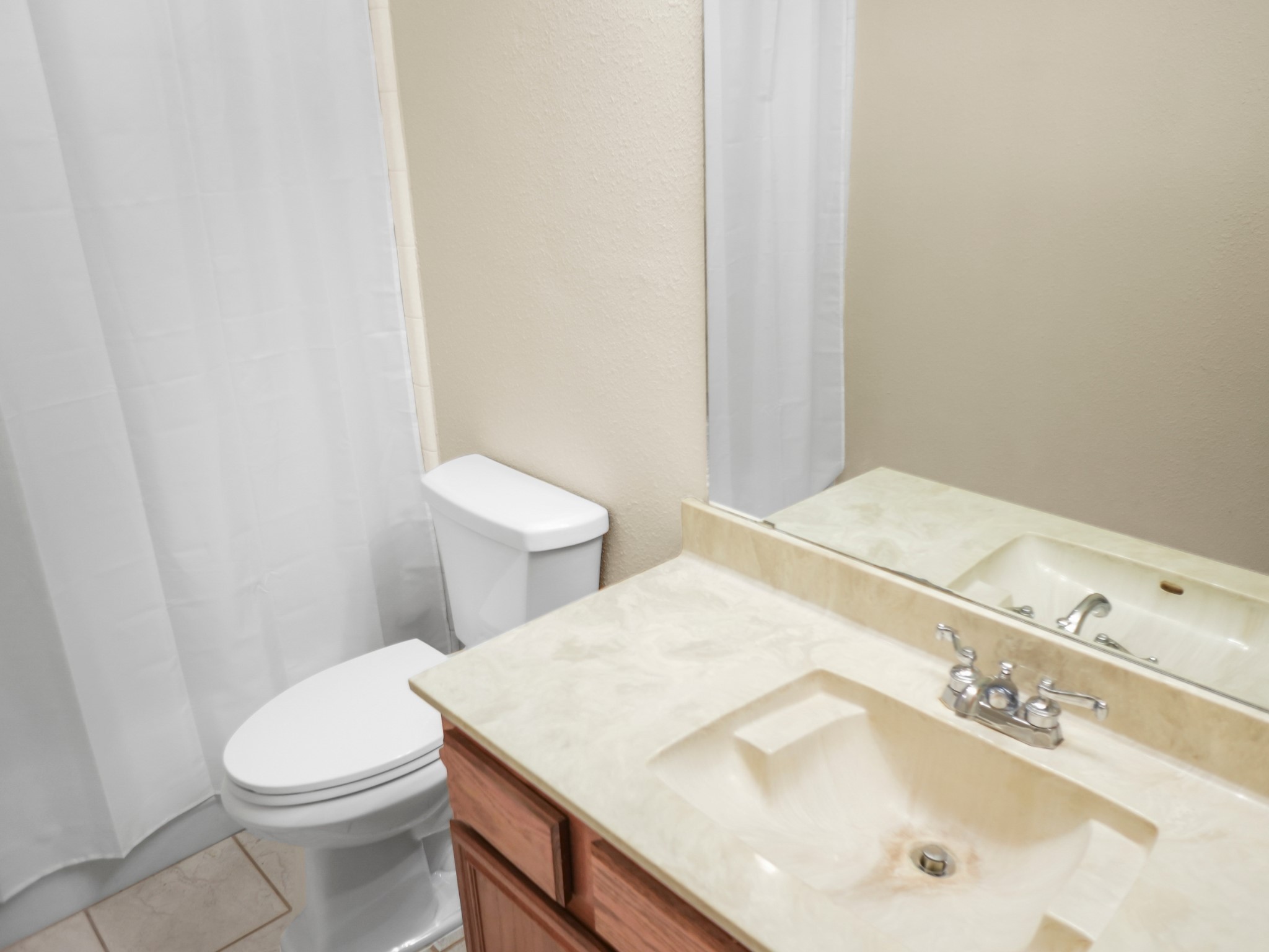 19623 Westbridge Lane Spring, TX 77379 - Photo 40 of 48 a bathroom with a sink and a toilet