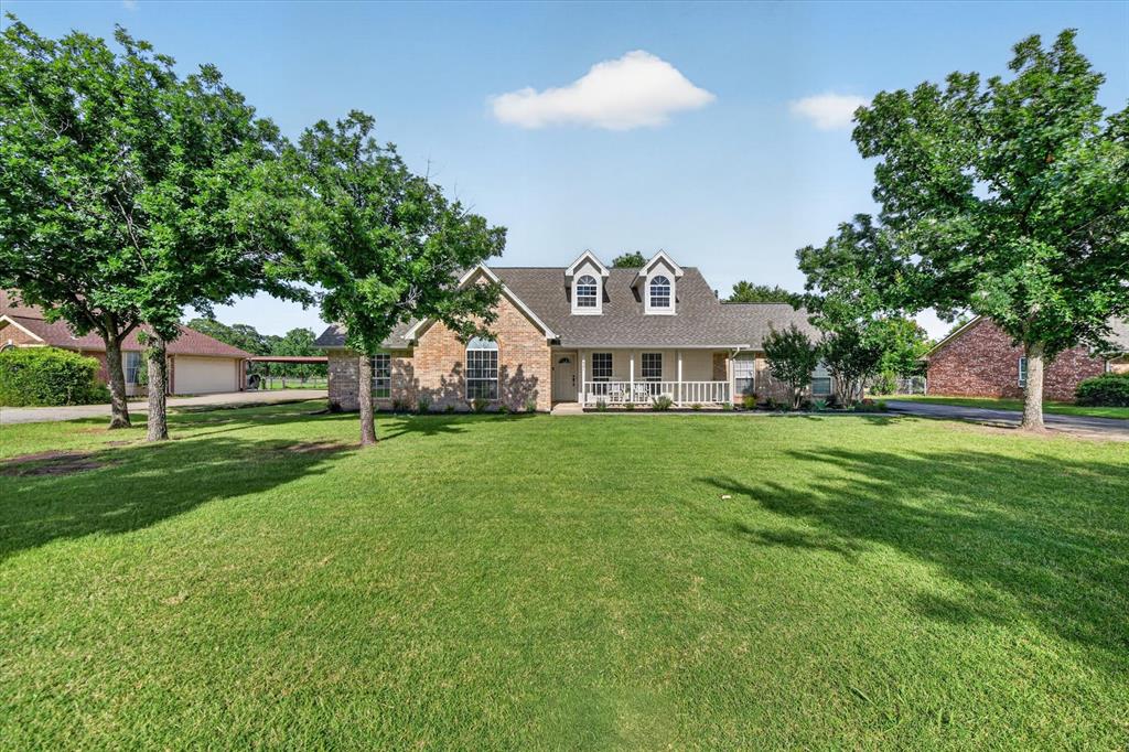 421 Ben Boyd Road Argyle, TX 76226 - Photo 3 of 25 Spacious front lawn with mature trees