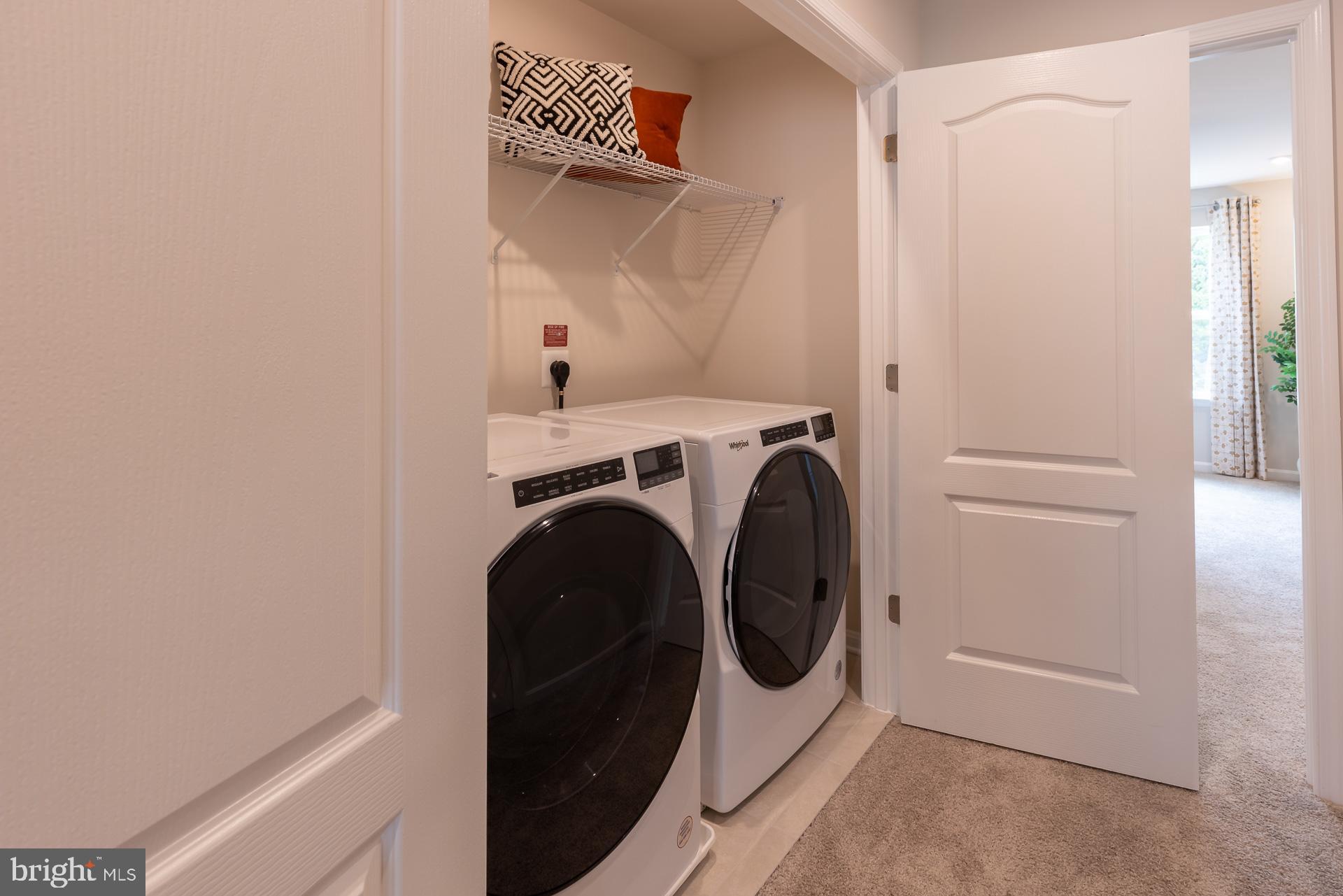 8272 Longford Road Glen Burnie, MD 21061 - Photo 9 of 11 a utility room with dryer and washer