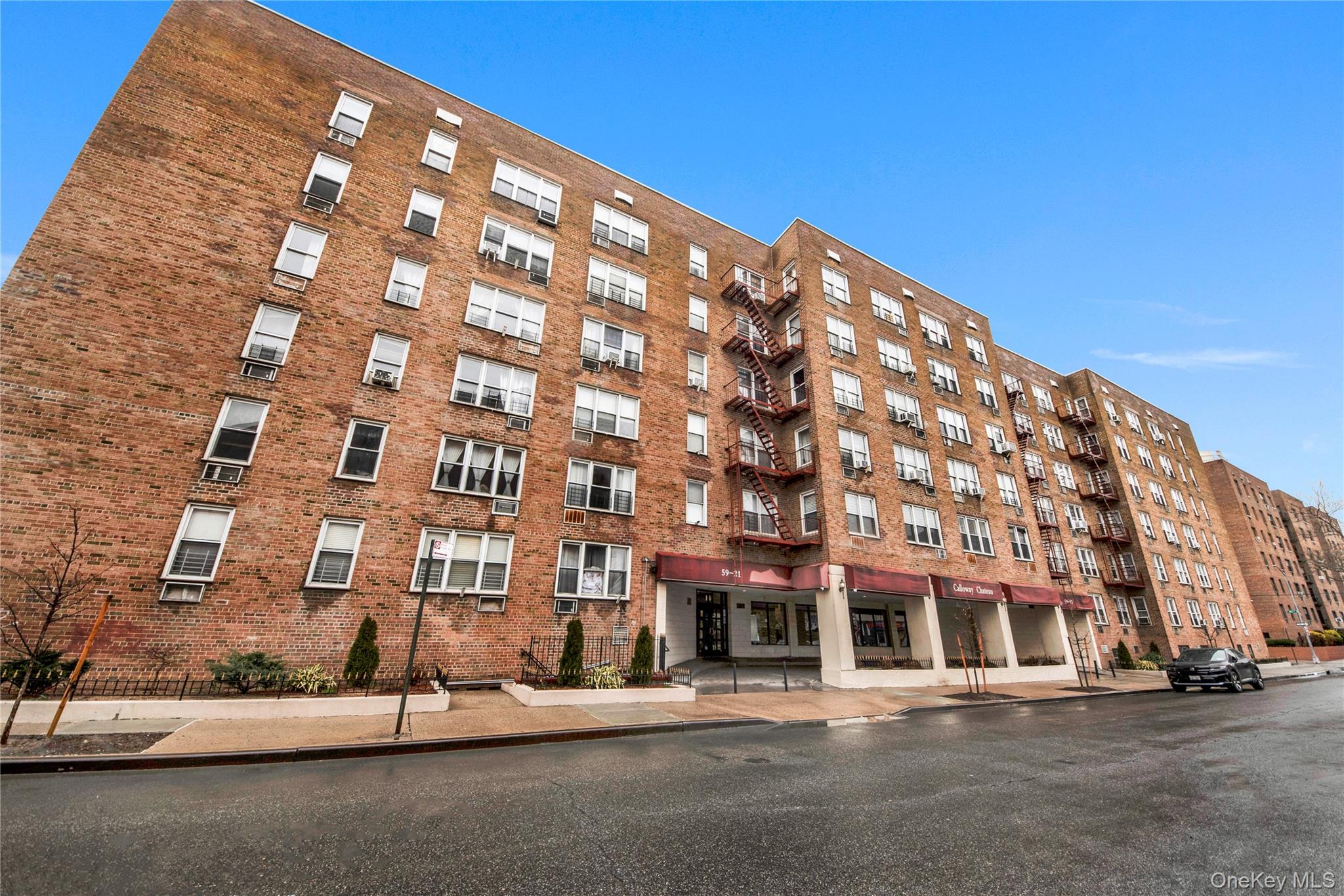 59-21 Calloway Street, Unit 5F Queens, NY 11368 - Photo 1 of 1 a view of a tall building