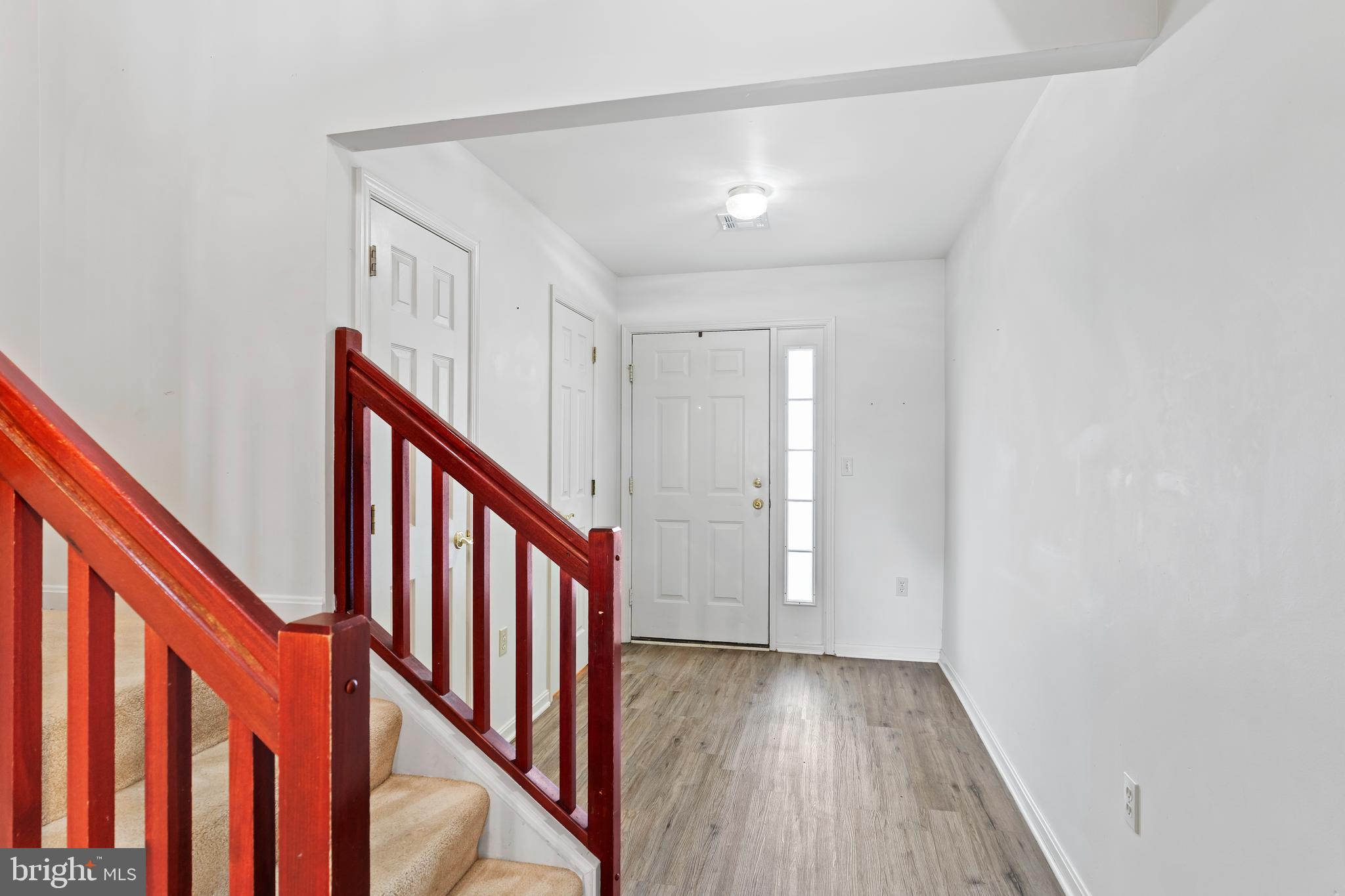 149 Cardinal Lane Hummelstown, PA 17036 - Photo 14 of 28 a view of an entryway with wooden floor