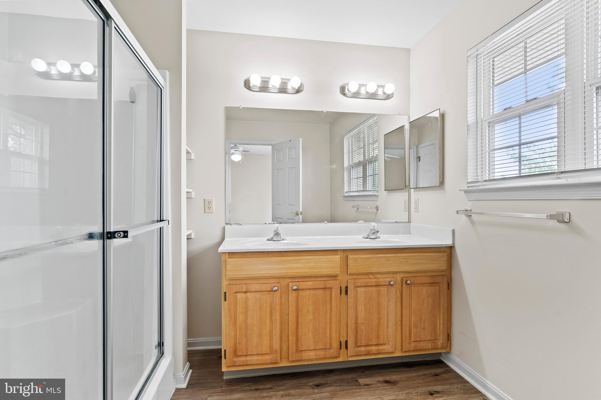 149 Cardinal Lane Hummelstown, PA 17036 - Photo 18 of 28 a spacious bathroom with a granite countertop sink a mirror and a bathtub