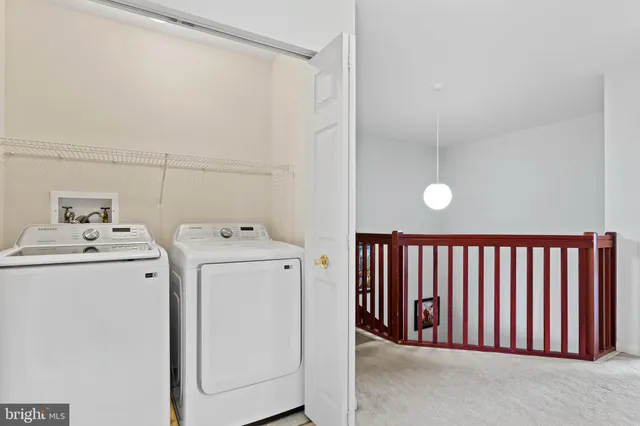 a backyard of a house with yard and outdoor seating