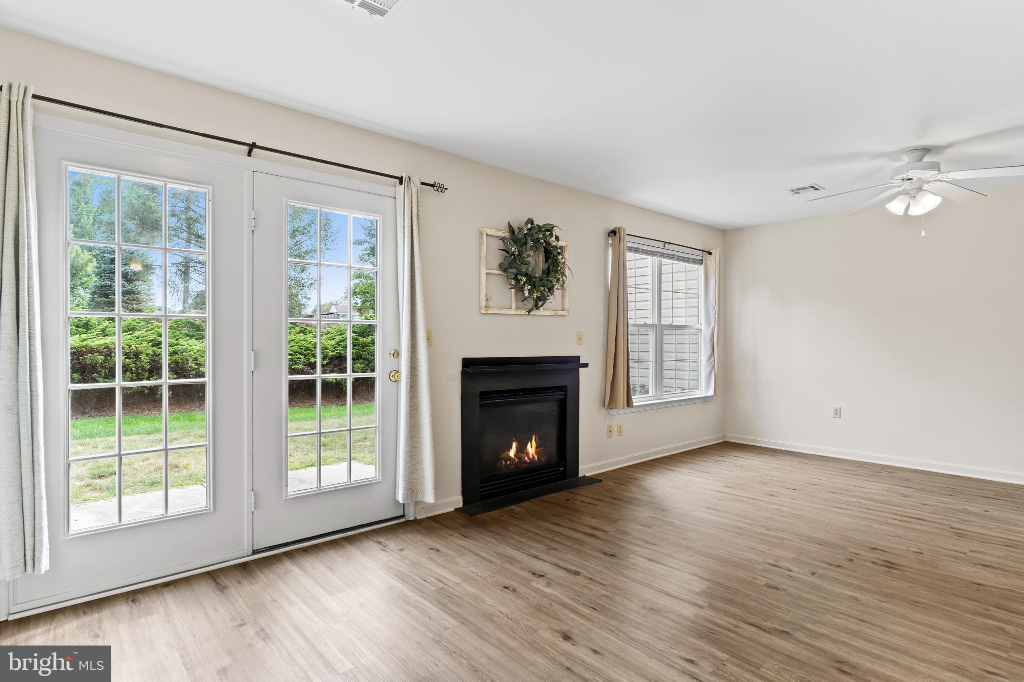 149 Cardinal Lane Hummelstown, PA 17036 - Photo 9 of 28 a view of an empty room with wooden floor and a window