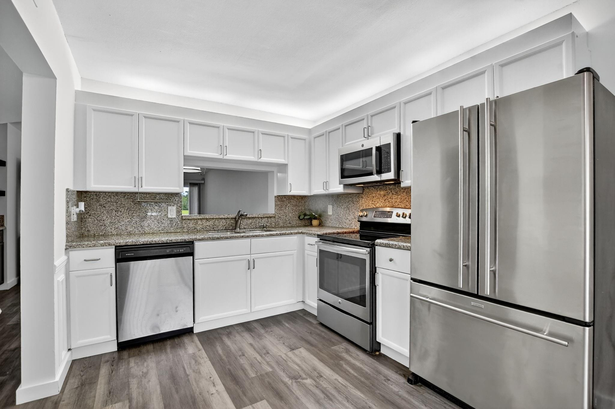 260 Northwest 67th Street, Unit A104 Boca Raton, FL 33487 - Photo 5 of 47 Photo 4