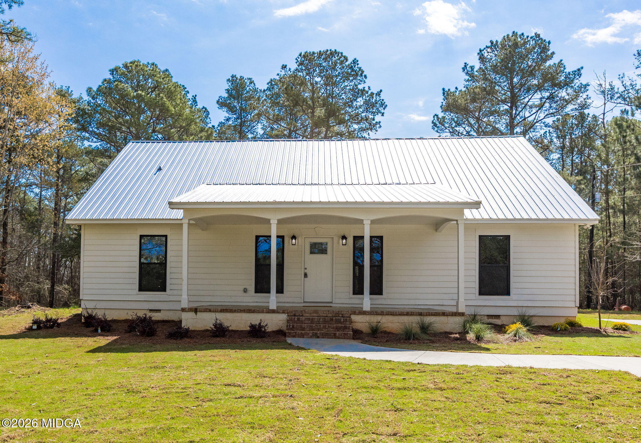 137 Buck Road Gray, GA 31032 - Photo 1 of 35 a view of a house with a swimming pool