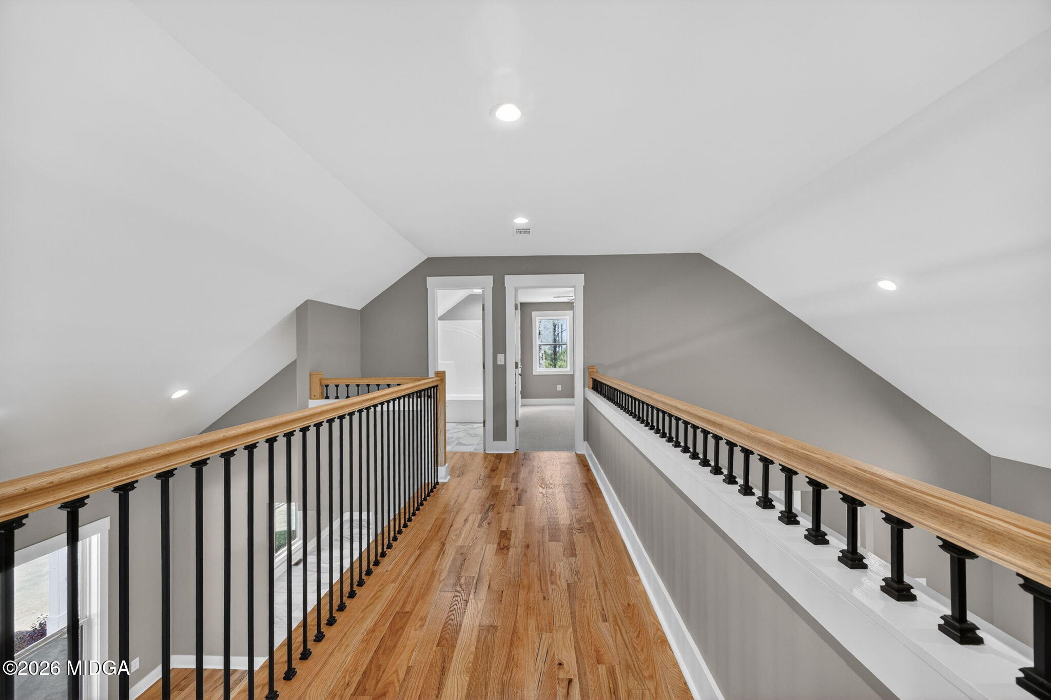 137 Buck Road Gray, GA 31032 - Photo 24 of 35 a view of a hallway with wooden floor and staircase