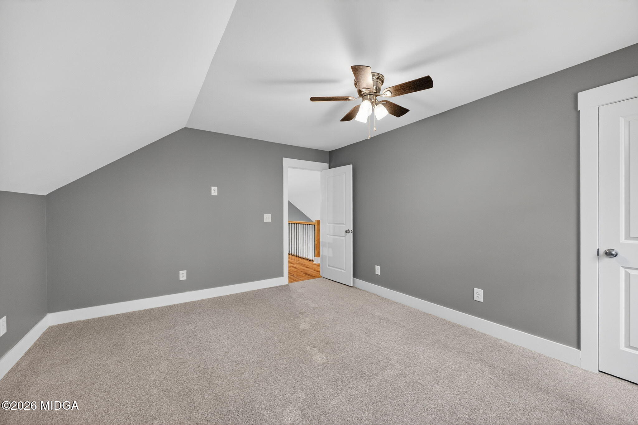 137 Buck Road Gray, GA 31032 - Photo 26 of 35 an empty room with closet and a ceiling fan