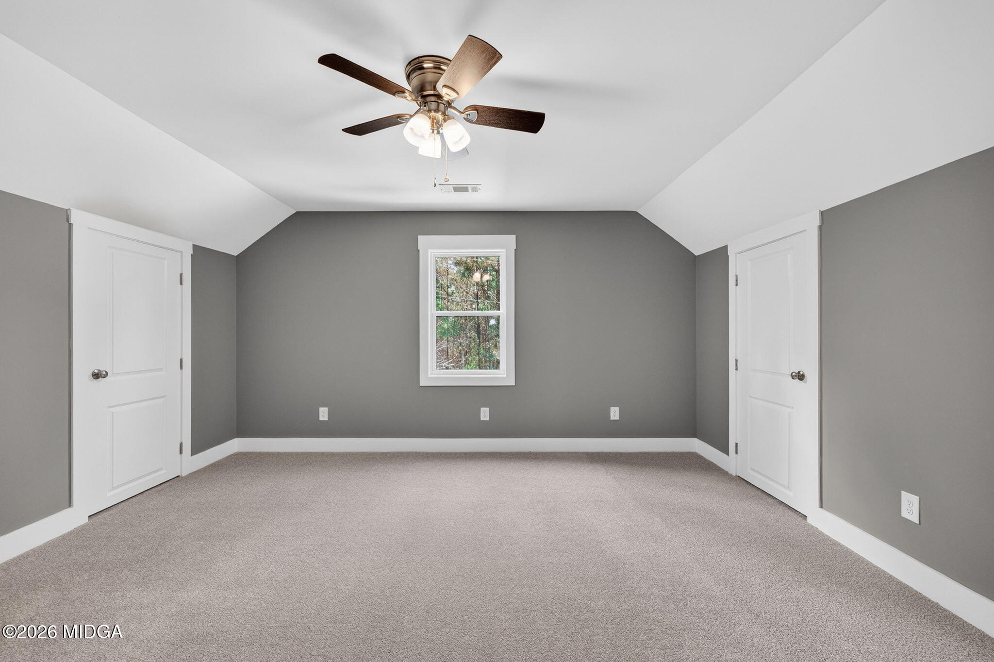137 Buck Road Gray, GA 31032 - Photo 28 of 35 an empty room with windows and fan