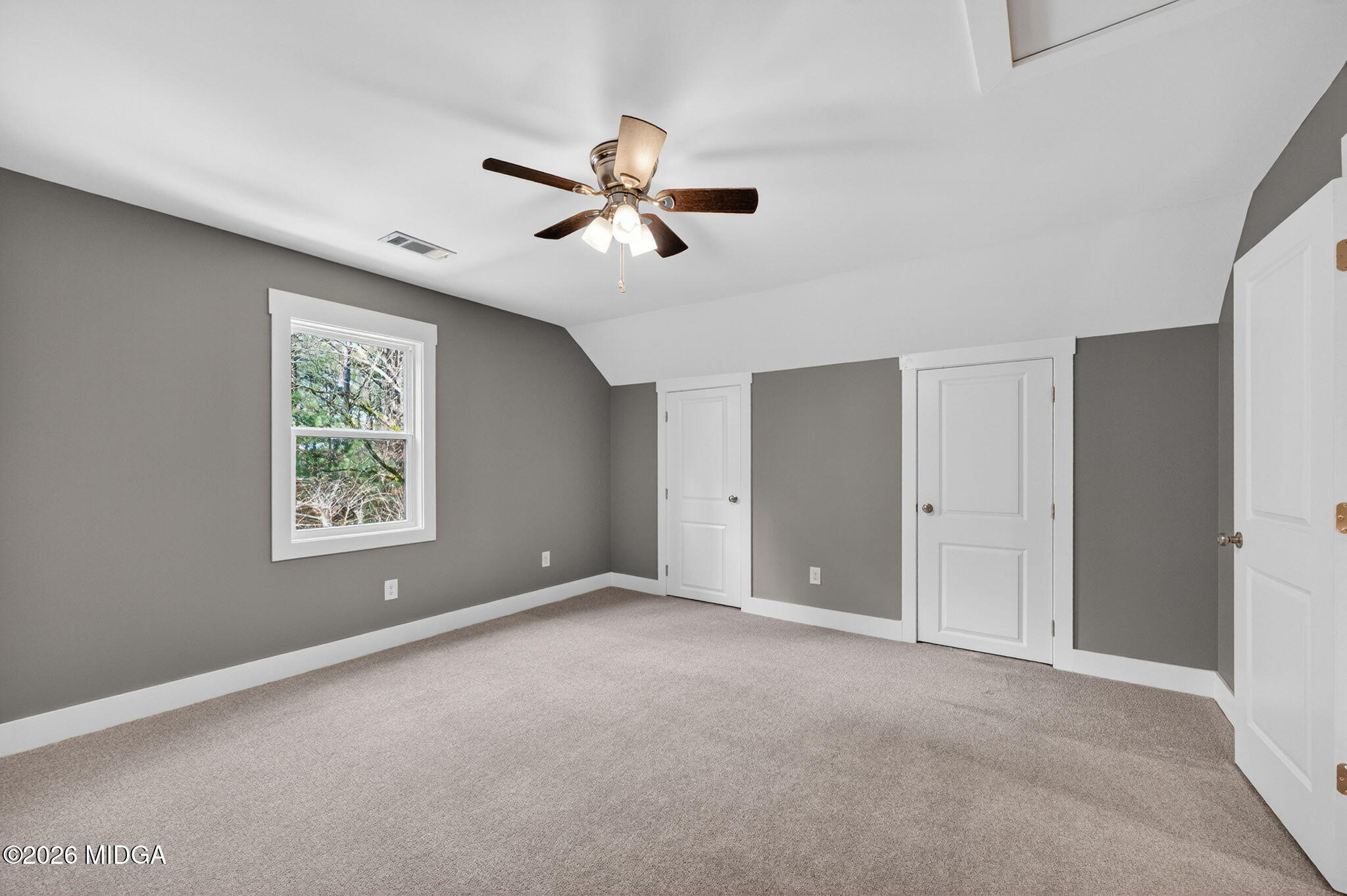 137 Buck Road Gray, GA 31032 - Photo 29 of 35 a view of an empty room with a window