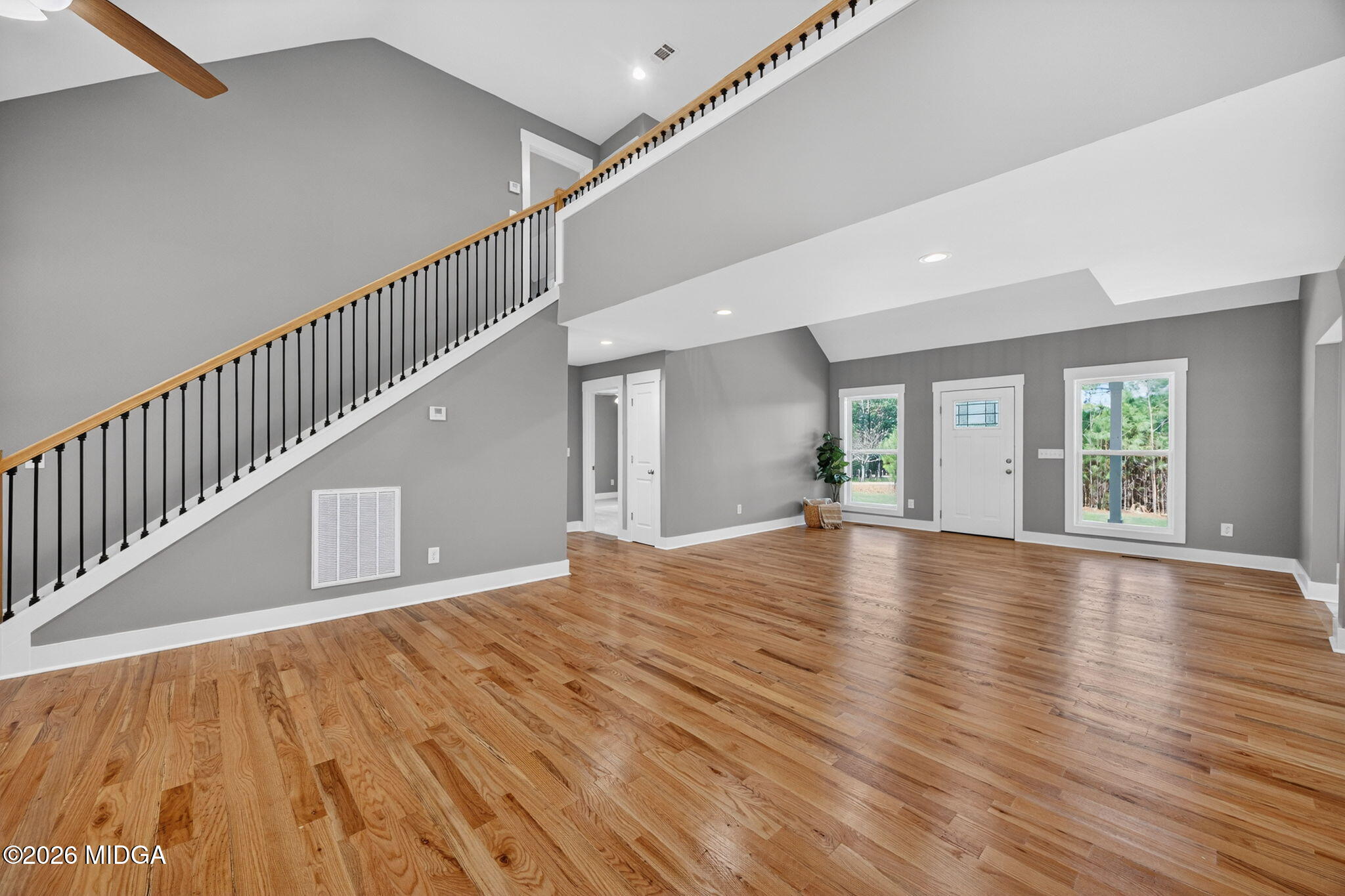 137 Buck Road Gray, GA 31032 - Photo 7 of 35 a view of empty room with wooden floor and fan