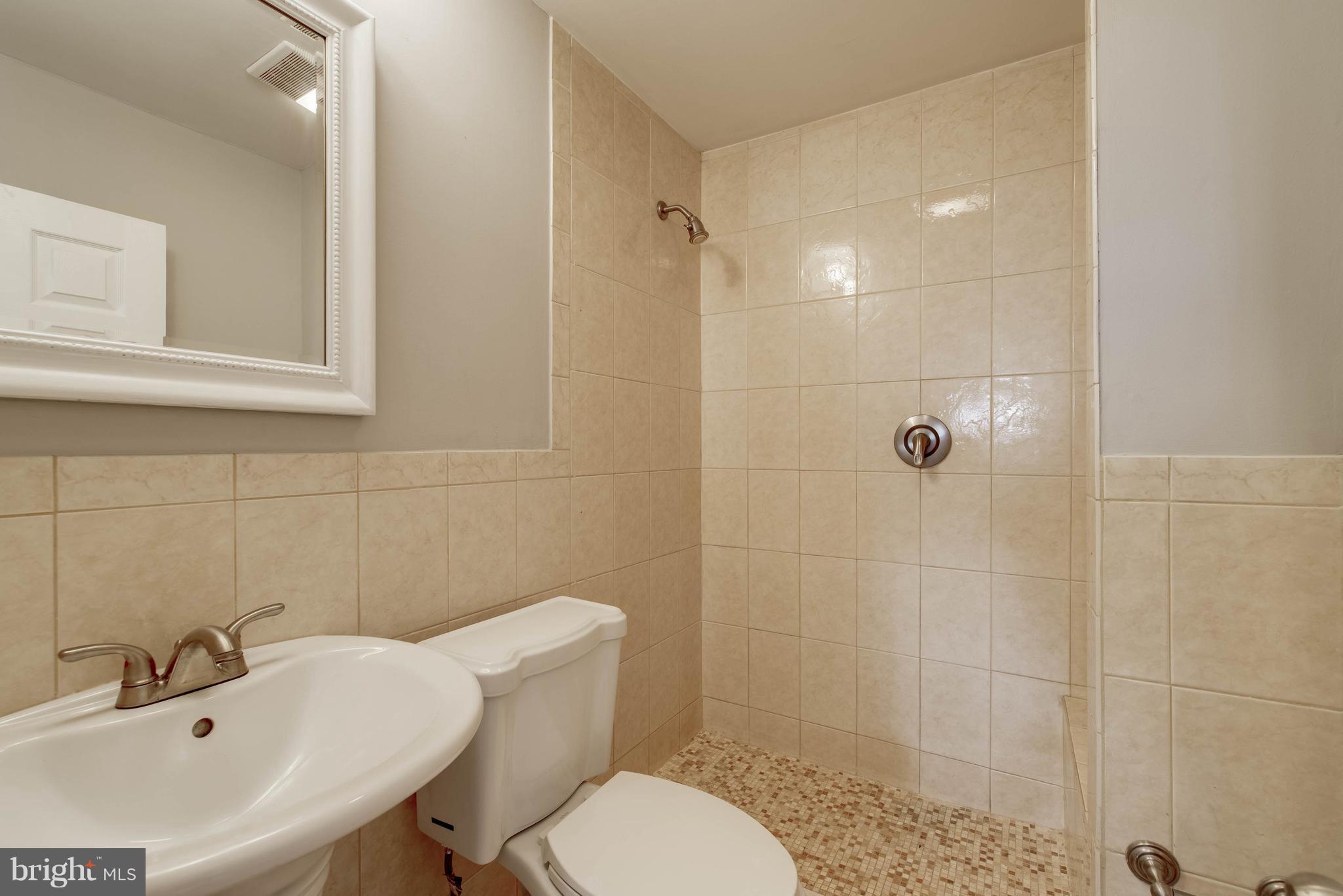 4709 Mawani Road Baltimore, MD 21206 - Photo 12 of 22 Exquisite Touches in Full Bath