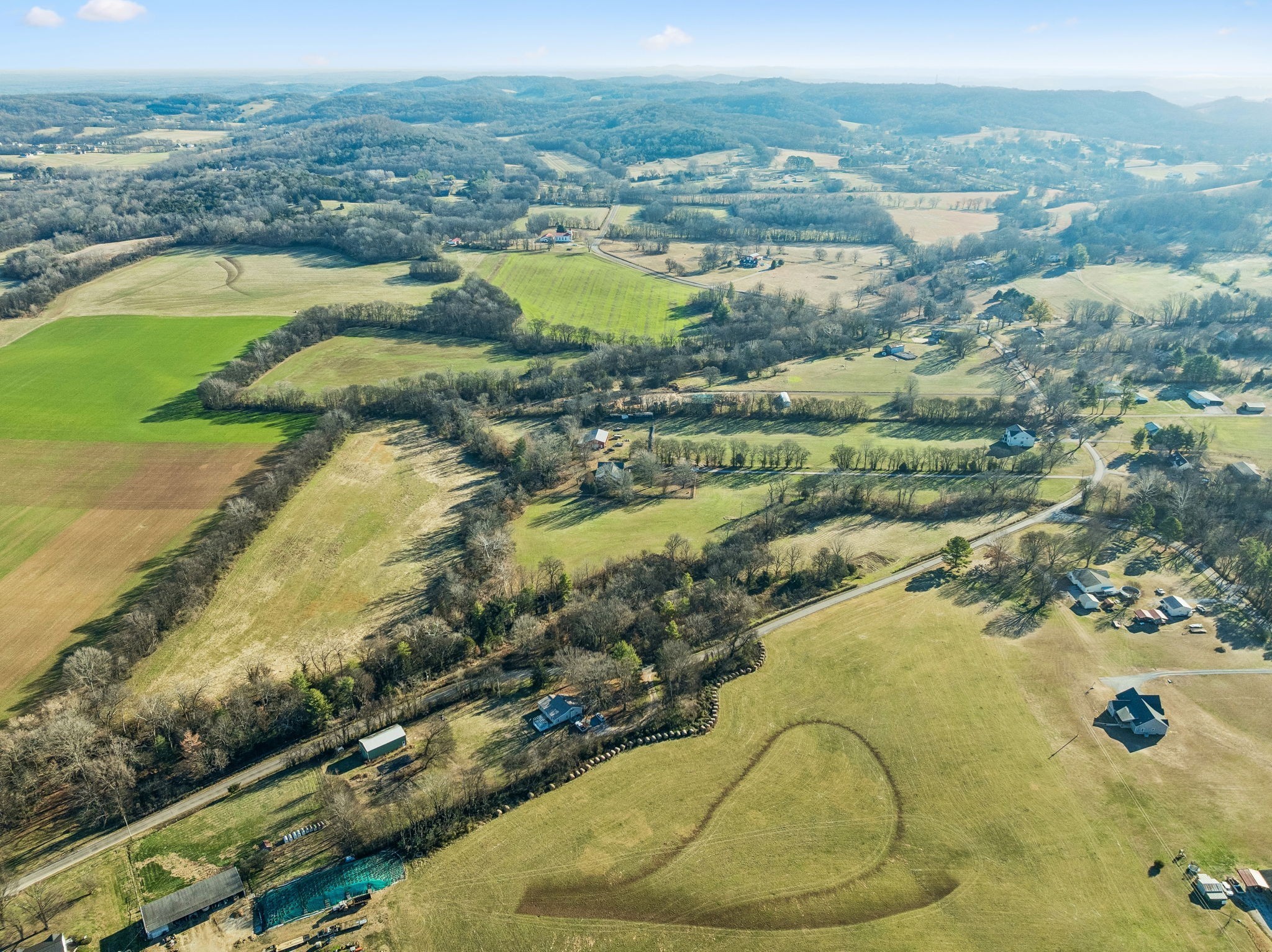 0 Buck Matthews Road Culleoka, TN 38451 - Photo 28 of 69 an aerial view of residential houses with outdoor space and swimming pool
