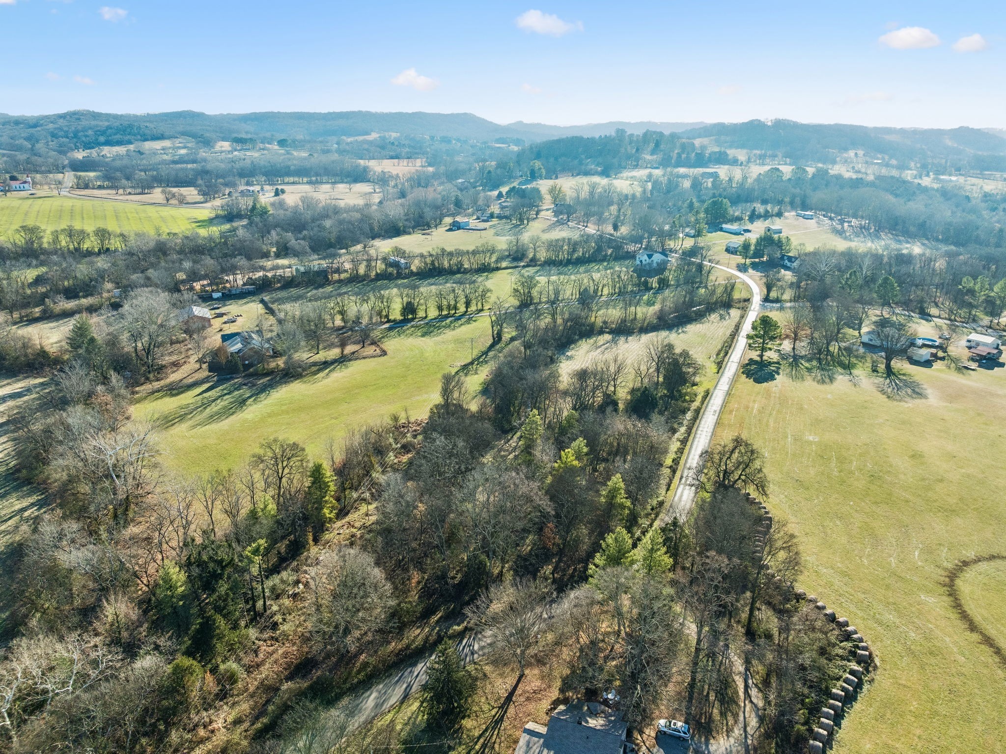 0 Buck Matthews Road Culleoka, TN 38451 - Photo 47 of 69 a view of a lake with a mountain