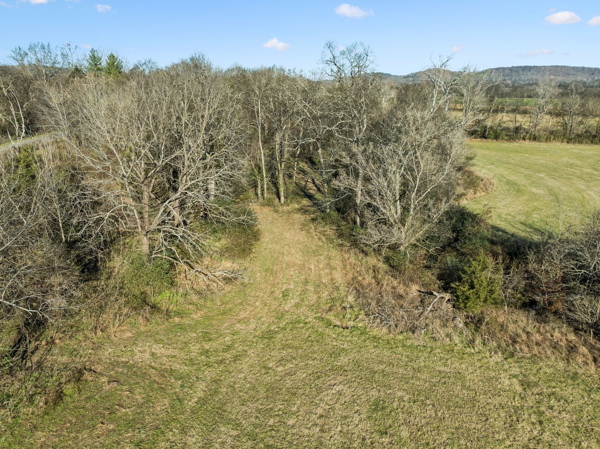 0 Buck Matthews Road Culleoka, TN 38451 - Photo 62 of 69 a view of a lake with mountains in the background