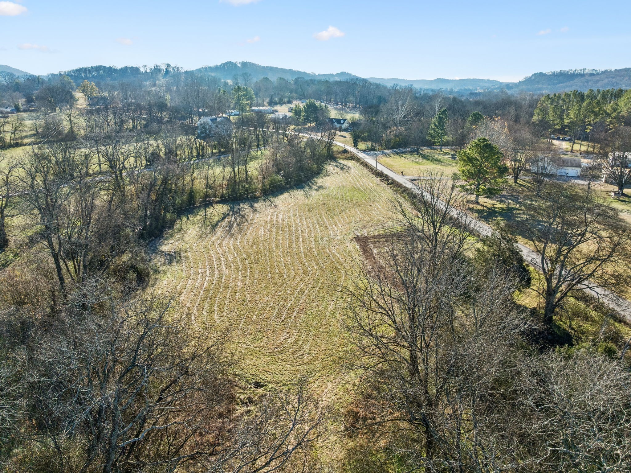 0 Buck Matthews Road Culleoka, TN 38451 - Photo 63 of 69 a view of a town with mountains in the background