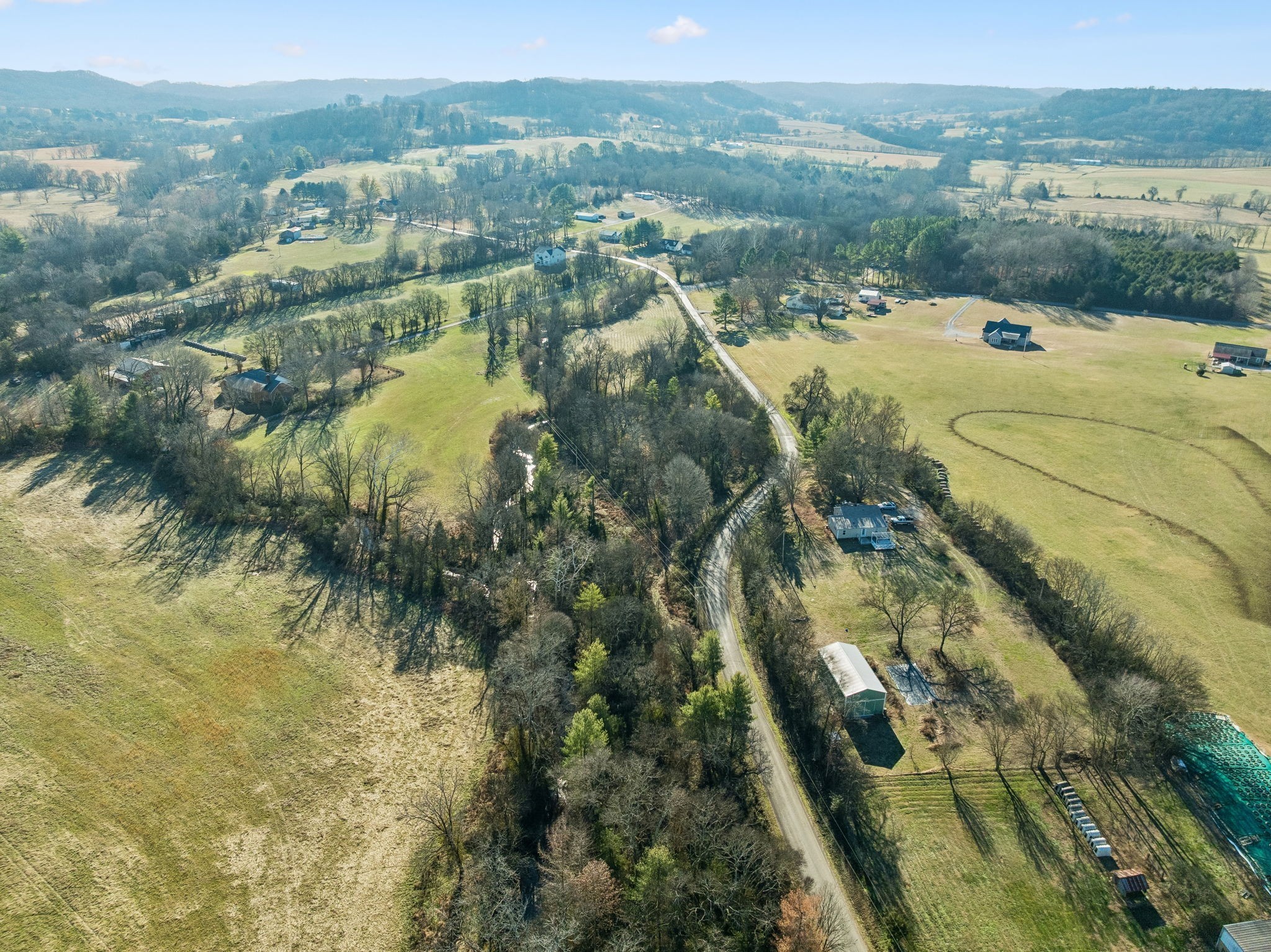 0 Buck Matthews Road Culleoka, TN 38451 - Photo 67 of 69 a view of a lake with a mountain in the background
