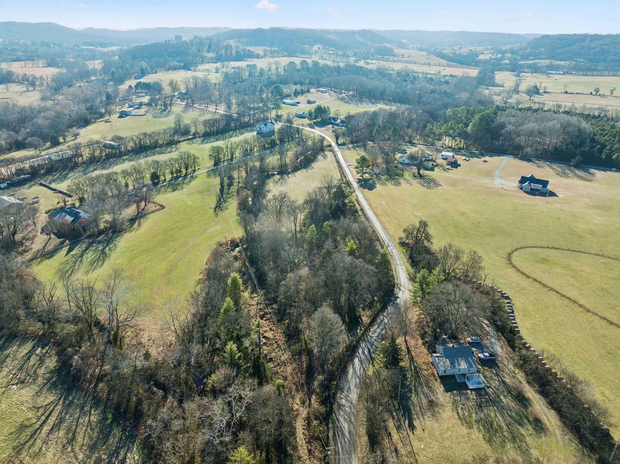 0 Buck Matthews Road Culleoka, TN 38451 - Photo 68 of 69 a view of a lake with a mountain