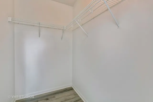 a view of a room with racks on the wall