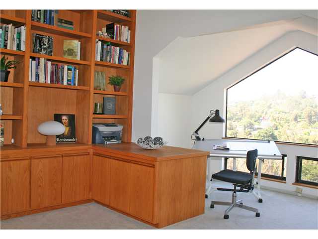 4920 Rancho Grande Del Mar, CA 92014 - Photo 21 of 25 Library loft area with magnificent tree top views of the valley below. Could be used as an office.
